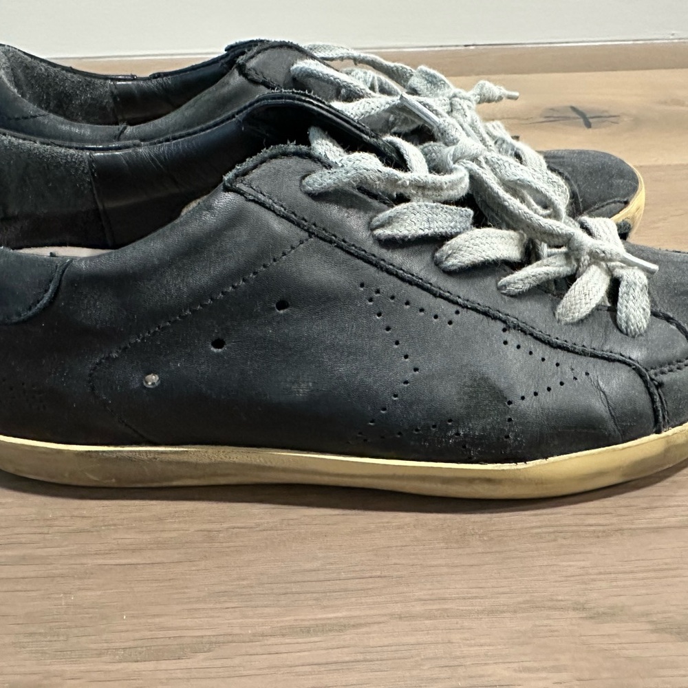 Golden Goose Black Sneakers with Gold Trim